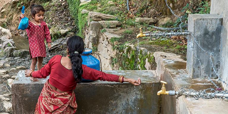 Community taps and pumps save women and children in rural Nepal from trekking long distances to fetch water.  Photo exclusively licensed to the Asian Development Bank until 2021.