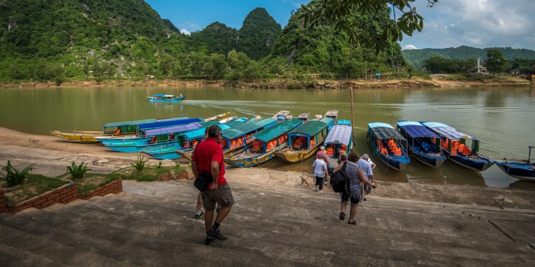 Blue boats transporting tourists going to Phong Nha, Viet Nam. The wharf was funded by ADB’s Greater Mekong Subregion Sustainable Tourism Development Project, giving local people more work opportunities. Photo Credit: ADB.