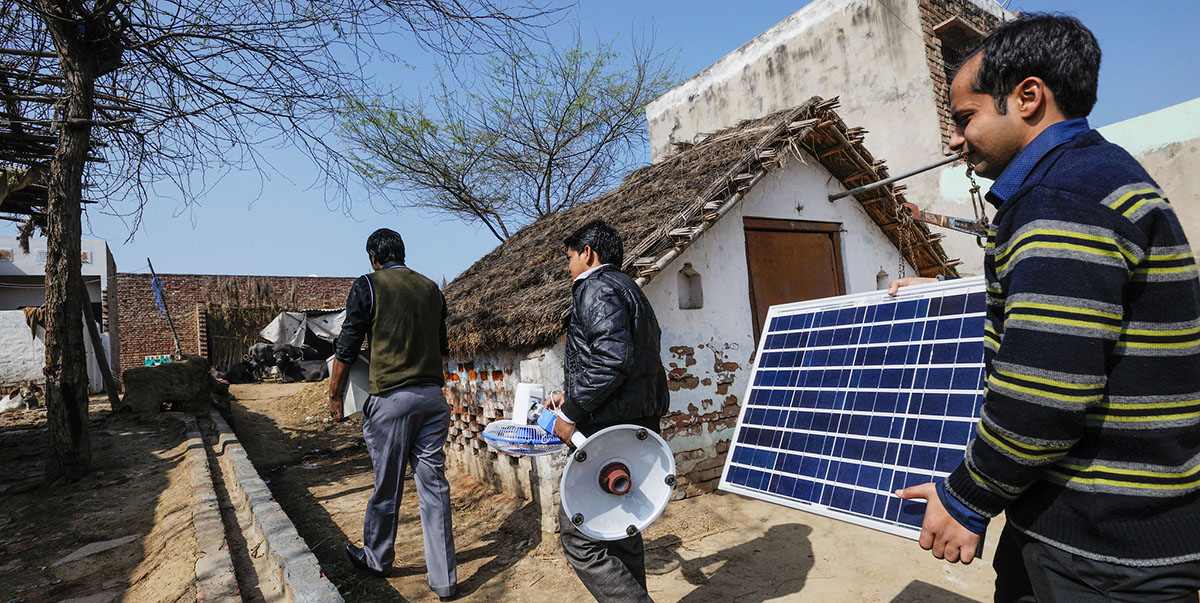 Sales agents visit a remote village in India to demonstrate their off-grid solar system. Improving access to clean energy needs the support of businesses and consumers. Photo credit: Asian Development Bank. 