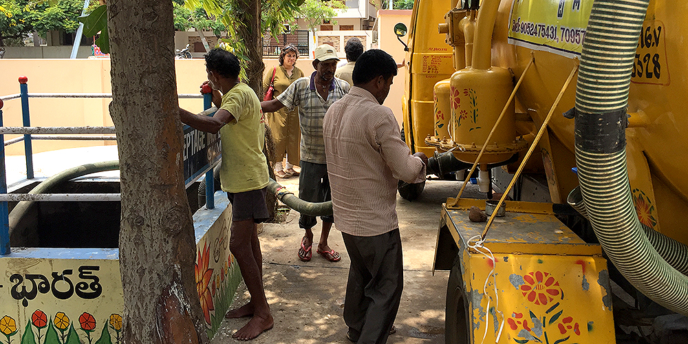Emptying a vacuum tanker at a sewer discharge point in Visakhapatnam, India. Photo credit: Water & Sanitation for the Urban Poor.