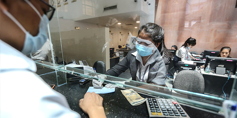 The COVID-19 pandemic has disrupted cash flows, including payments, investments, and remittances. Photo credit: ADB.