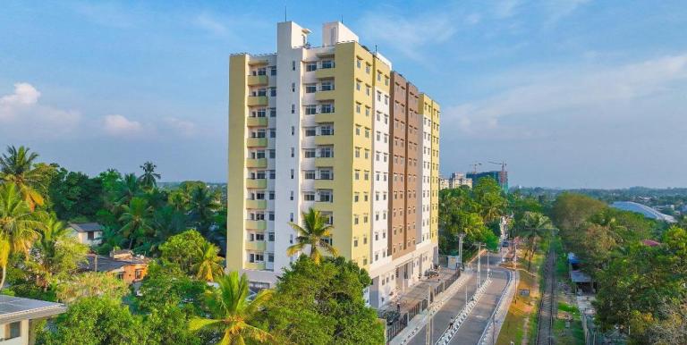 Aerial view of the completed 12-storey Pearl City Residencies in Malapalla, constructed for households relocated from the Kelani Valley railway corridor. Photo credit: Maga Engineering (Pvt) Ltd. 