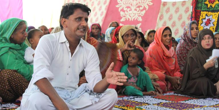 A resident shares the community’s challenges and needs during a consultation meeting for the Sindh Emergency Housing Reconstruction Project. Photo credit: ADB.