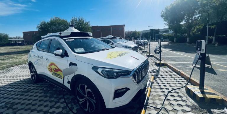 A driverless electric robotaxi (Apollo Go) navigating Beijing streets showcases the future of low-emission transport. Photo credit: Khalil Raza. 