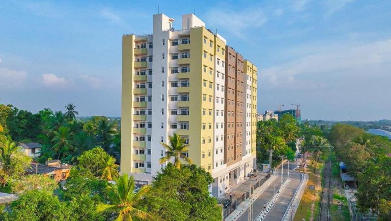 Aerial view of the completed 12-storey Pearl City Residencies in Malapalla, constructed for households relocated from the Kelani Valley railway corridor. Photo credit: Maga Engineering (Pvt) Ltd. 